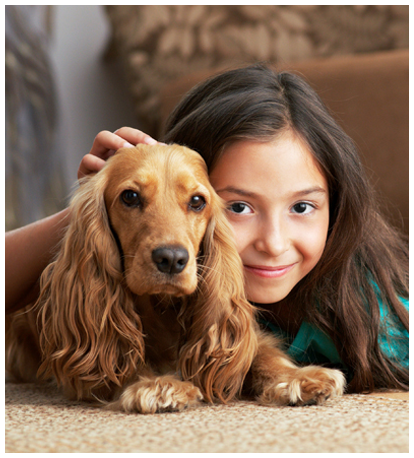 Child Laying on Floor with Dog in West New York, NJ